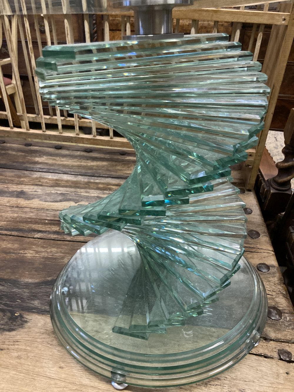 A contemporary circular glass occasional table, diameter 60cm height 50cm